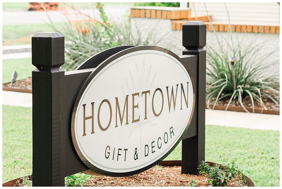 close up photo of a boutique sign in Round Rock, TX for Hometown Gift & Decor