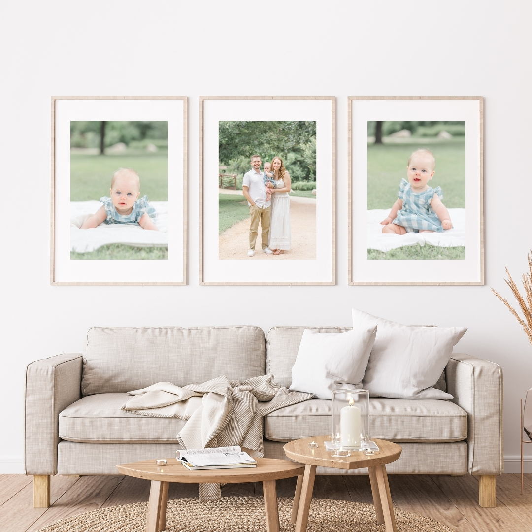 Professional Printing | mockup of framed family photos hanging above a beige couch in a living room. There are three framed pictures. The one in the middle is of a family with a baby. The two frames in the outside have a print of the baby only. The photos were taken by a family photographer in Austin, TX. 